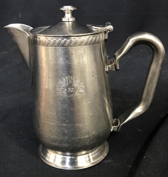 Vintage LEGION UTENSILS Plated Pitcher: Possibly silver plated. Needs cleaning. Simple design. Measures approximately 6 inches in height. Lid flips up. A monogram engraved on the body of the pitcher. Vintage coffee pot, coffee pot, silver p