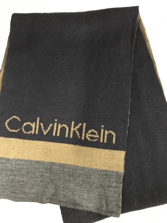 CALVIN KLEIN Knitted Scarf: Made of acrylic. Measures 11 x 66 in. Classic & Vintage Calvin Klein Block Colors- Black, Moss, Grey w / brand name on Scarf. Made in China. Hand Wash. Men or Woman Scarf, unisex scarf, Wearable Acces