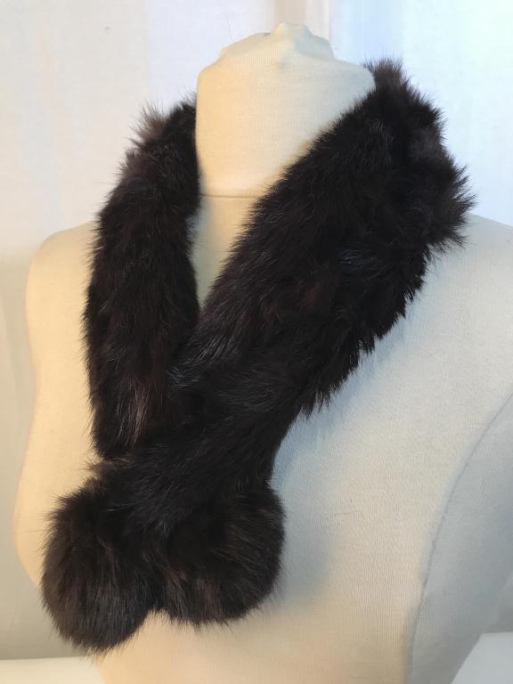 Luxury Vintage Rabbit Fur Scarf: Luxury vintage fashion accessory. Dark Brown tone rabbit fur with ball ends. Measures approx 31 inches in length. Pelt is in good condition. Vintage fashion accessory, fur scarf, stole, Shawl, outdoor
