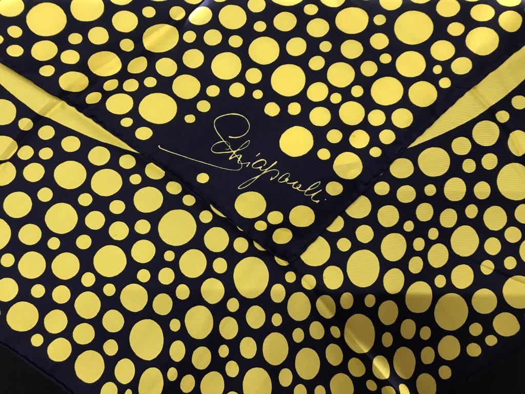 ELSA SCHIAPARELLI COUTURE Polka Dot Silk Scarf: Vintage Couture Elsa Schiaparelli silk square shape scarf, 27 x 27 in. Yellow polka dot bubbles on navy background with large center circle. Schiaparelli was the greatest rival to Coco Chanel & alongs