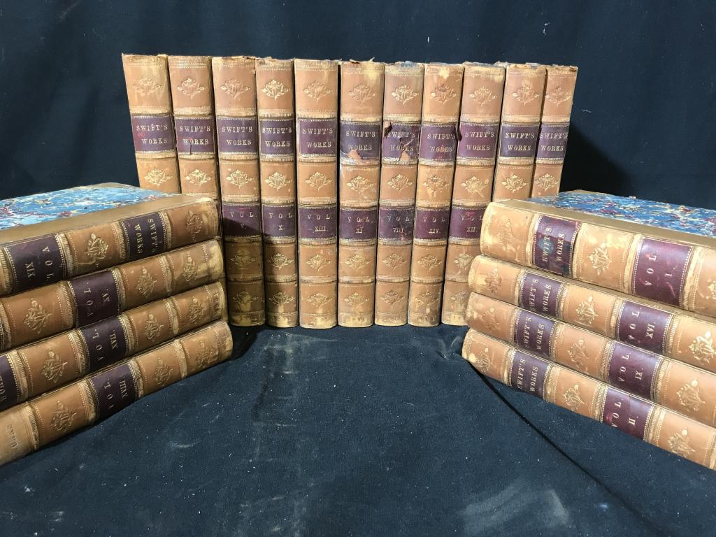 19 Volume Set JONATHAN SWIFT Antique Books: Lot includes 19 volumes of Jonathan Swift’s Works, antique leather-bound books, published in 1801. Volumes 1 through 19. Each book measures approx 9.5 inches in height by 6.25 inches in width by 1.5