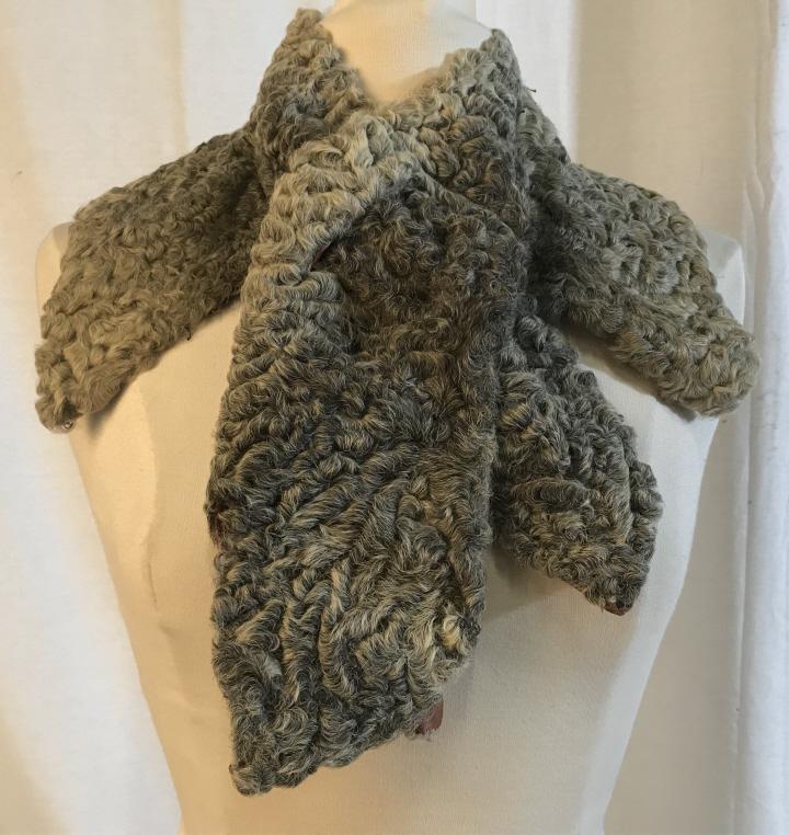 Lot 3 Persian Lamb Fur Fashion Accessories: Lot includes Persian lamb fur collar, scarf, and cuffs. Fur is salt&pepper grey in tone. Undersides of accessories are unfinished, pieces can be sewed onto garments for fur details. Longest piece, fur