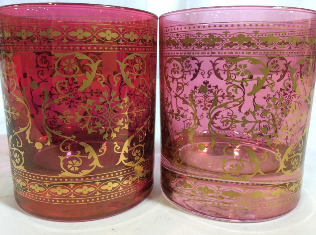 Lot 4 Bohemian Style Gem Colored Cocktail Glasses: Amethyst purple toned, Aqua, Pink & Watermelon green toned, All have gold tone Middle Eastern Design. Measure 3.5 in. height, 3 in. diameter. No chips or scratches. Glassware, Barware, Rum Glasses, Co