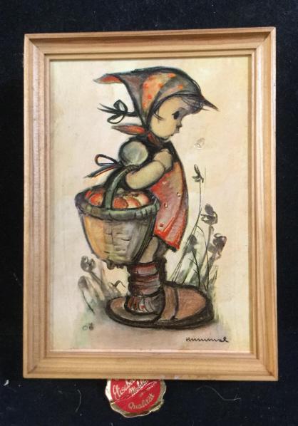 Vintage Hummel Wood Music Box, W. Germany: Girl with basket of apples in large clogs. Framed print attached to wooden box. Pull cord for music does not work. Originally played ‘ Lara’s Theme’ from Dr.Zhivago. Label reads ‘ Original Eli