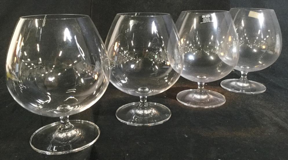 TYROL CRYSTAL SNIFFERS, Set 4 Barware: 24 % lead Austrian crystal. Label reads ‘ Made in Austria, Tyrol Crystal, Designer by RIEDEL, LEAD CRYSTAL’. hallmark on underside. 6 in. Tall. Opening, 2 3/4 in diameter, glass circumference, 14.