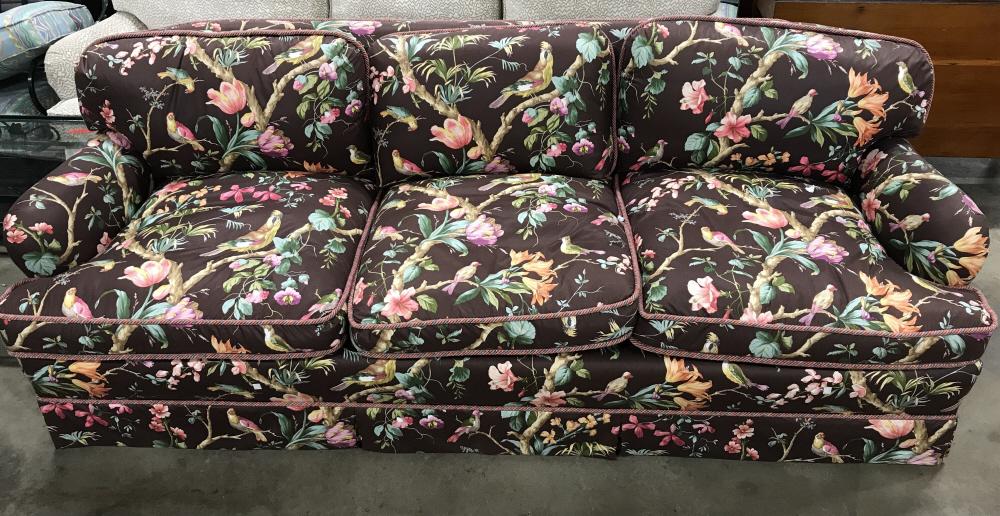 Upholstered Down Filled Sofa In Luxury Fabric: Upholstered Down Filled Sofa In Luxury Fabric, possibly Brunschwig, and Multicolored Barley Twist Cord Trim, Luxury fabric is chocolate toned in background with vibrant floral, branch, and bird design