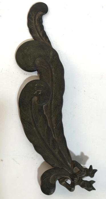 CIRCA 1920s Iron Feather Wall Decor: Wall decor made from possibly circa 1920s. Measures approximately 11 inches long. Design is of feathers tied together at the bottom. Wall decor, iron wall decor, antique, vintage, vintage iron, antiqu