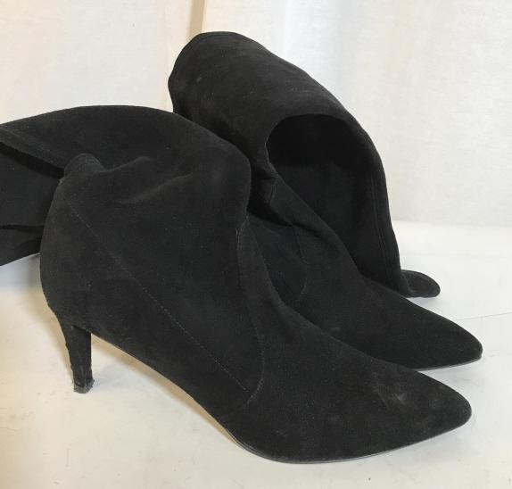 STUART WIITZMAN POINT TOE BLACK HEELED BOOTS: reads Made in Spain. Size 10. Inside is likely lined with satin. SW print on ball of sole. Back of heels have wear to them. Below the knee length. Heel is approximately 3.5 inches tall. Boots, shoes,
