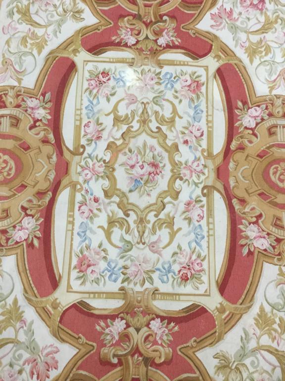 Handmade Aubusson Floral Detailed Wool Rug: Rug is handmade & appears to be Wool. Contains multi toned floral detail with tones of red, light blue, sand, olive & gold. Piece measures approx 146 inches long 106 inches wide. Rug, carpet, area rug