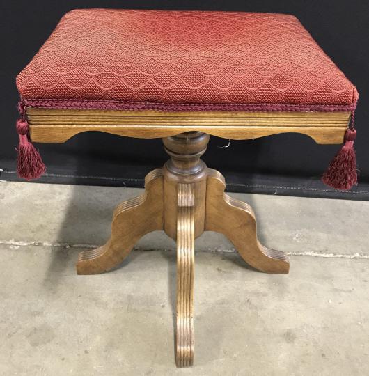 Antique Oak Piano Organ Stool: Antique Oak Piano Organ Stool With turned center column, four carved legged base, and red toned upholstered seat with corner tassels, marked on underside C Parker Meriden CO, measures approximately 19