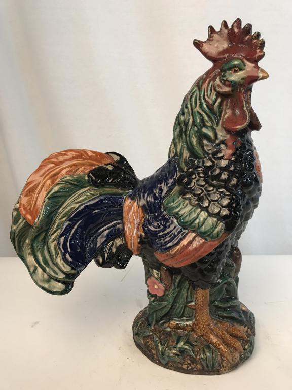 Hand-Painted Majolica Pottery Rooster Sculpture: Hand-Painted Majolica rooster sculpture. Underside is impressed with number ‘15.’ Measures approx 16.5 inches in height by 12.5 inches in length by 6 inches in width. Majolica ceramics, majolica p