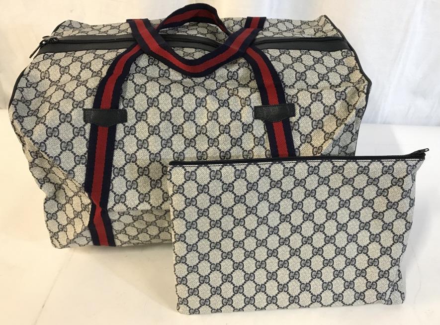 Genuine NIB Gucci Boston Large Duffle Bag: Genuine New In Box Gucci Boston Duffle, Large, Navy Sherry Web Blue GG Supreme Canvas Weekend/Travel Bag, Gold Toned tag on interior reads Gucci Italy, serial number on reverse of interior tag reads 0