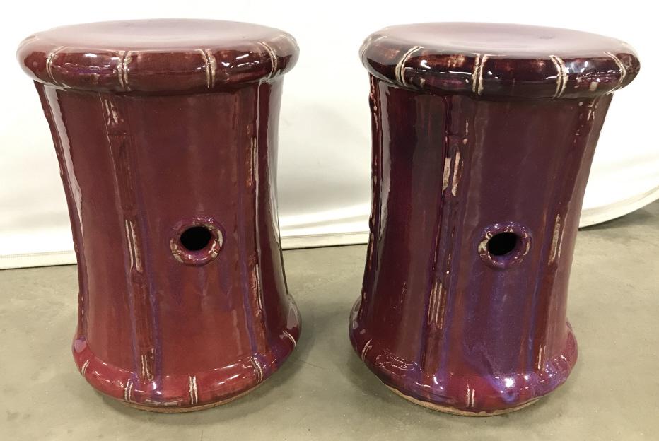 Pair Contemporary Style Ceramic Garden Stools: Pair Ceramic Contemporary Bamboo Style Garden Stools with cut out handles and red and purple glazed finish, no condition issues noted, measures approximately 19 inches tall x 13 inches in diameter. Ce