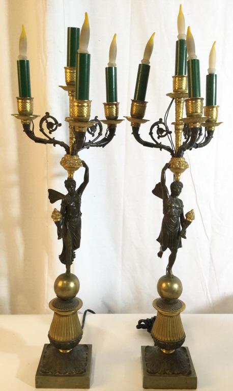 Pair 19th Century French Empire Bronze Candelabras: Lot includes 2 Candelabras. Each have Bronze angelic figures. Pieces also have gold toned Arm ends. Arms appear to be Bronze with c curve detail. Each piece has 4 arms. Each measures approx 30 inches 