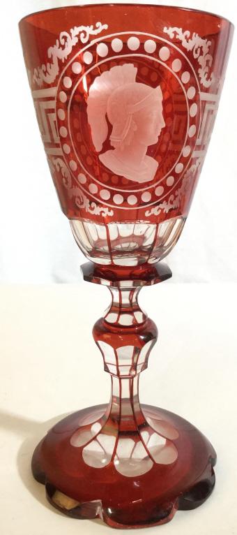 Vintage Cranberry Art Glass Chalice: Piece is cranberry toned with intricate frosted detail. Cranberry glass, art glass, bohemian glass, art glass Chalice, vintage art glass. Piece measures approx 10.5 inches tall 4 inches wide. Lower ar