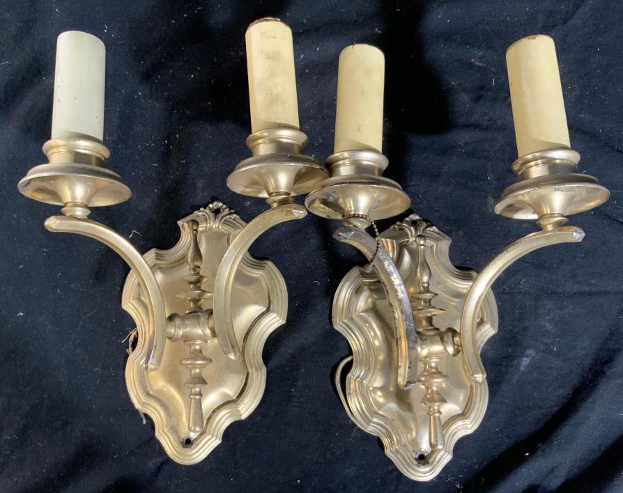 Pair Caldwell Vintage Sconce Lights: Marked on back with C, each wall mount light fixture is gold on metal, two arm candelabra style with back plates, each measures ht app 13 inches width 9 inches depth 6 inches, lighting, decorative art