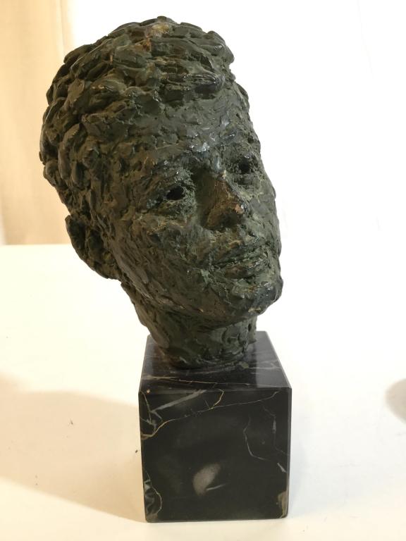 John F Kennedy Head Figural: Figural appears to be ceramic. Base is cube shaped & appears to be Marble. Piece measures approx 8 inches tall 3.5 inches wide. statuary, bust figural, shelf piece, decorative arts and decor 6.