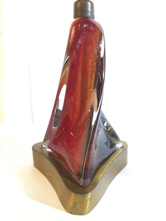 Lot 2 MURANO Art Glass Lamps: Lot includes 2 art glass lamps. One has a red orange tone the other has a copper & gold tone. Each have round3d triangle shaped bases which are gold toned & appear to be brass. Larger lamp measures ap