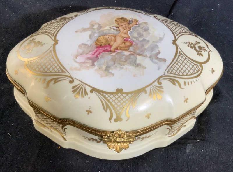 Limoges Porcelain Gilded Metal Jewelry Box: Vintage possibly antique Limoges Jewelry Box, keep sake Box, dresser box, made in France, has Gilded metal frame and latch, gold painted accents and Putti Design scene, puttis, cherubs angels, measure