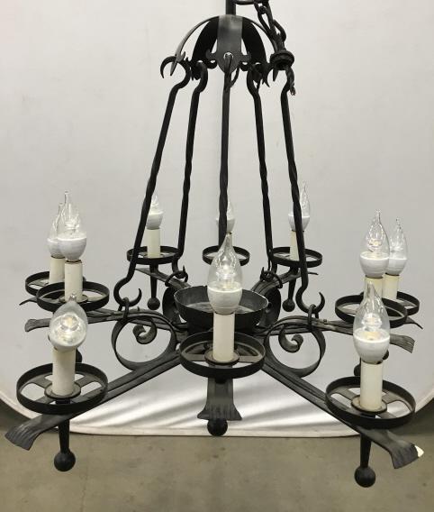 Vintage Gothic Style Wrought Iron Chandelier: Vintage Gothic Style Wrought Iron Black Toned Chandelier with five lights, not tested, may need new wiring, marked with illegible tag, measures approximately 25 inches in diameter x 25 inch drop. Some