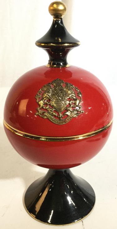 MURRAY FEIS Lidded Vessel: Underside of piece is marked HAND MADE IN ITALY FLORENTINE. Vessel is red, gold and black toned. Lid appears to have a coat of arms. Measures approx 9 inches tall 4.5 inches wide. Lid handle appears t