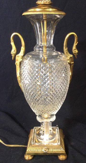 Baccarat Style Brass & Cut Crystal Lamp: Lamp is Cut Crystal And Brass. Piece is footed. Also contains crane head handle detail on each side. Measures approx 30 inches tall 7 inches wide. home decor, grand, swan head design, crane head desig