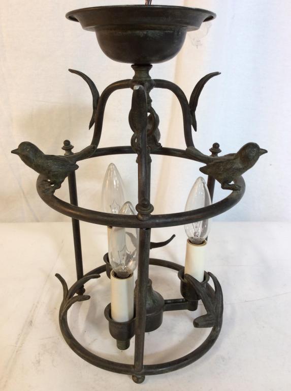 Italian Hanging Metal Ceiling Lamp: Lamp has tag which reads MADE IN ITALY. Piece has 3 bird Figurals perched near top. Contains 3 Candlestick style bulb sockets. Piece measures approx 14 inches tall 8.5 inches wide. home decor, hanging