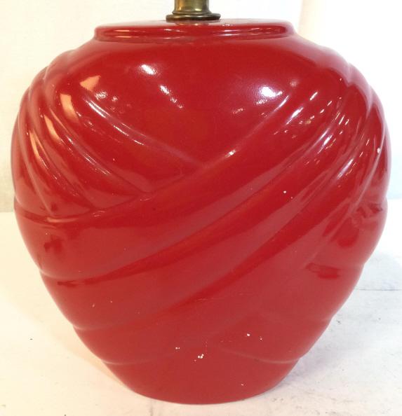 STIFFEL Red Toned Porcelain Table Lamp: Lamp is red toned and porcelain. Tag on bulb socket reads STIFFEL. Lamp includes finial. Table lamp, red lamp, porcelain lamp. Measures approx 22 inches tall 10 inches wide. home decor, colorful decor