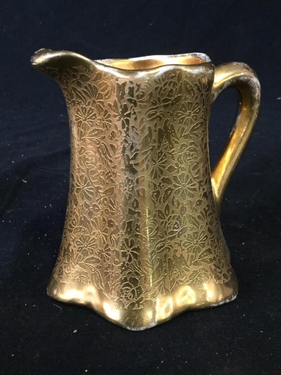Vintage Wheeling 22k Gold Creamer Signed: Bottom signed ransom. C.1920, 22k Gold. Titled Wheeling. Made by Wheeling gold. Measures approximately 4 inches tall. Visible wear. Gold, 22 karat, 22k gold, Random, Wheeling Gold, Wheeling, Creamer, 