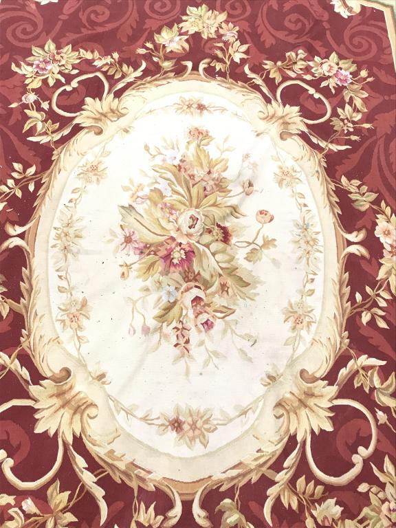 Vintage Handmade AUBUSSON Needlepoint Rug: Rug is wool & handmade. Piece contains multi toned floral & leaf detail including tones of red, olive, sand, gold, beige, & pink. Rug measures approx 168 inches long 119 inches wide. Aubusson Rug, Vin