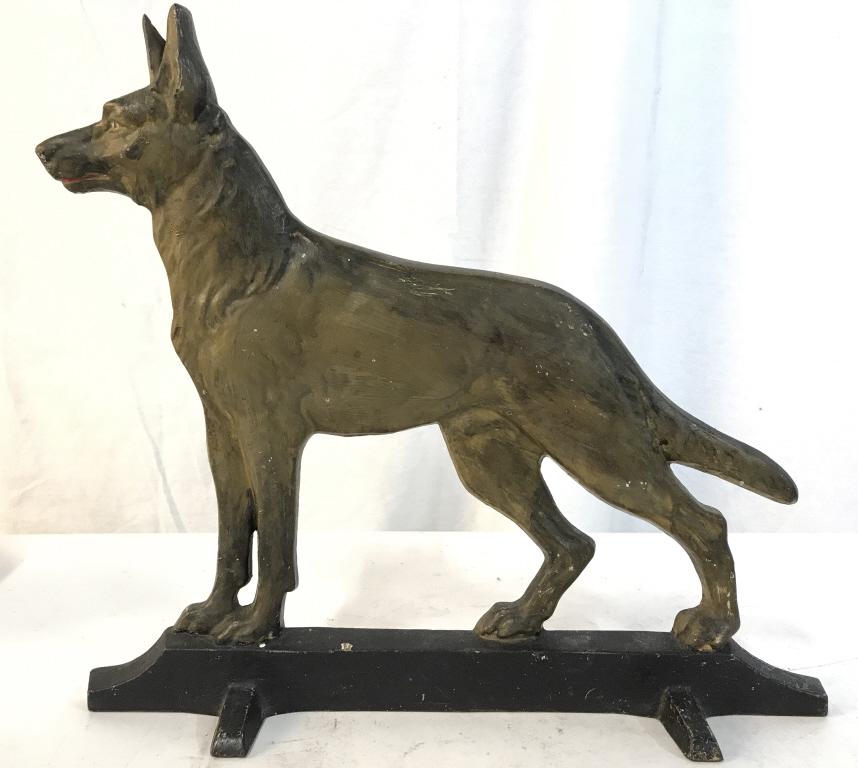 Vintage Painted Cast iron Dog Figural: Piece appears to be hand painted. Piece depicts a standing dog. Piece measures approx 14 inches long 12 inches tall. decorative arts and accessories, shelf piece, animal statuary, home decor, wall han