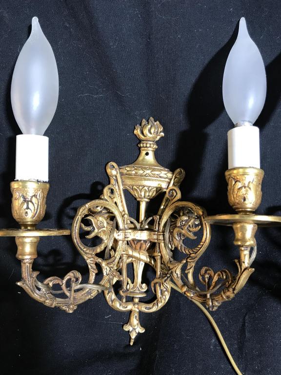 Pair ANTIQUE Bronze Victorian Sconces, c. 1890: ANTIQUE Candelabra Sconces, Victorian. Originally candelabras that affix to Wall, refitted as modern lighting. Hole at top center for affixing to wall. Electric wiring with Switch on/off cord. Detaile