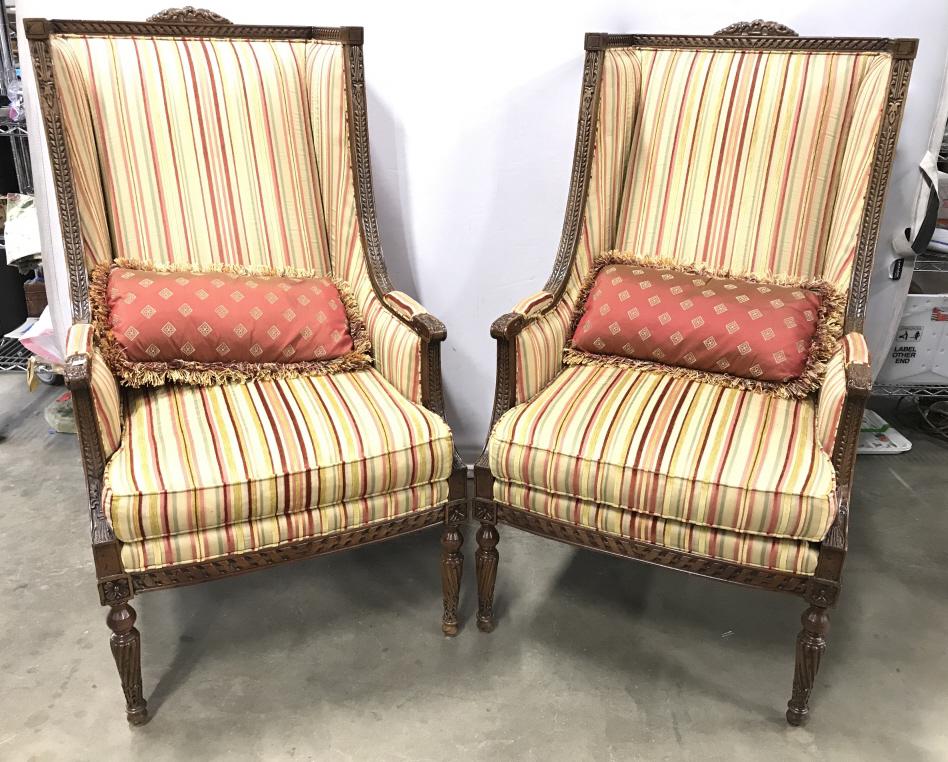 Southwood Carved Louis XVI Style Wing Chairs: Pair Southwood Carved Louis XVI Style Wing Salon Chairs with Striped Cut velvet upholstered fabric in red, green, gold tones on the front and seat cushion, red toned taffeta like fabric with gold tone