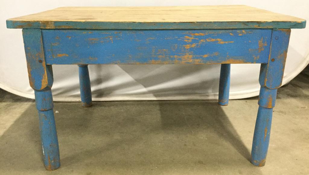 Vintage Wooden Coffee Table: Coffee table is vintage possibly antique. Piece has a light blue tone. Table has 4 legs. Piece measures approx 33 inches long 22 inches deep 19 inches tall. Piece has evident wear and scratches. coffe