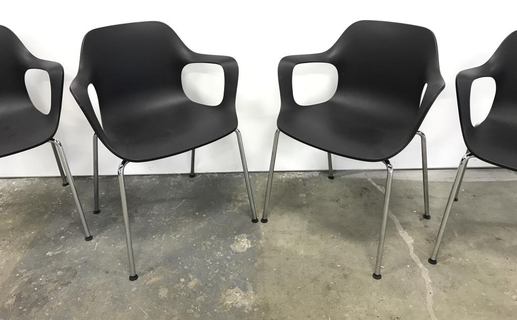 Set 4 VITRA Industrial Modern HAL Arm Chairs: Marked on underside of shell with VITRA Hal embossed into surface and addition VITRA Labels, minor scuffs to chairs due to stacking, measures approximately 31 inches tall at back x 24.5 inches wide x 