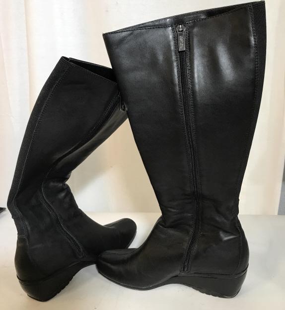Tall Leather Wedge Boots, Size 8 In Org. Box: Aetrex. leather boots. Black. Zipper up leg from foot. Seldom worn. About knee length. From heal to top measures 16 1/4 in. tall. Fits wider feet. Wedge heel, 1 3/4 in. Foot 8 M, 39.5 EU size. Still h