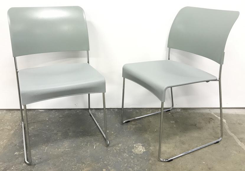 Pair Jasper Morrison Vitra SIM Chairs: Pair Jasper Morrison Vitra SIM Chairs in light bluish grey finish and tubular metal legs. With SIM, Jasper Morrison has created the perfect expression of the chair type inaugurated by David Rowland’
