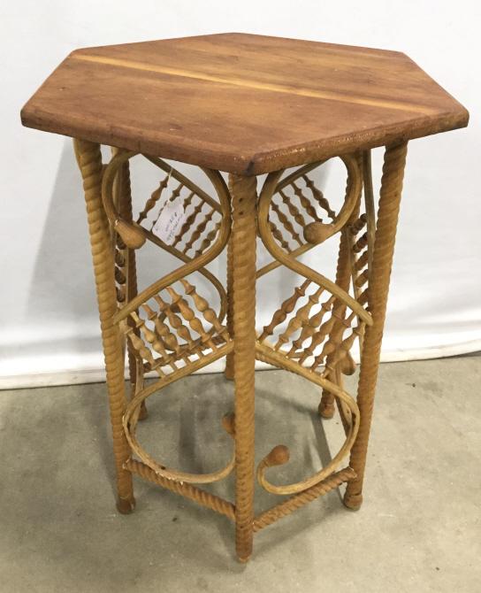 Vintage Carved Wooden Side Table: Table is vintage and wooden. Piece contains carved s curve detail. Vintage table, wooden table, wooden side table, carved wooden side table. Piece measures approx 25 inches tall 20 inches wide at wide