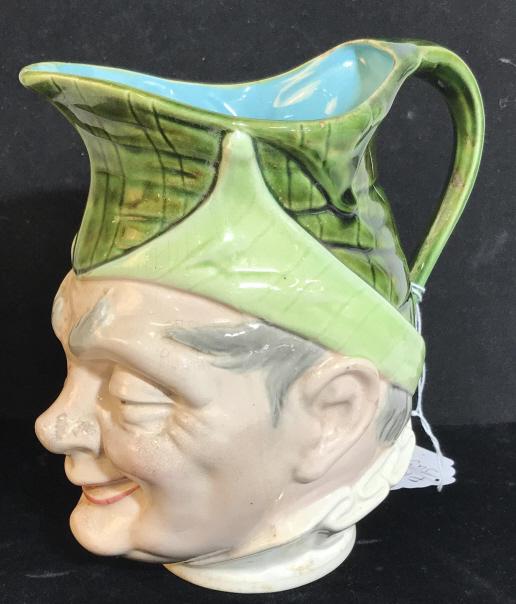Antique Sarreguemines French Majolica Jug, 19th C: Sarreguemines French majolica pitcher from the late 1880s. Ceramic Figural of a man. Measure 8 in. height, 7 in. Wide. Opening, 4.5 x 4 in. Underside reads ‘ Sarreguemines‘ with other marked numbe