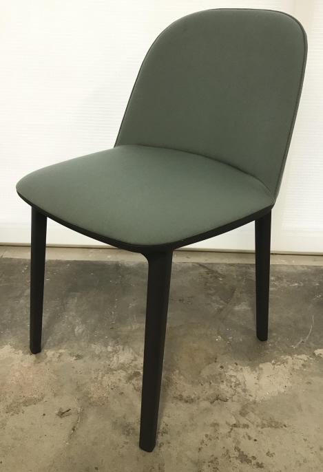VITRA Softshell Side Chair: The Softshell Side Chair, whose gentle contours are defined by its soft dark sage toned upholstery, provides exceptionally comfortable seating and compact dimensions: vertical ribs concealed in the up