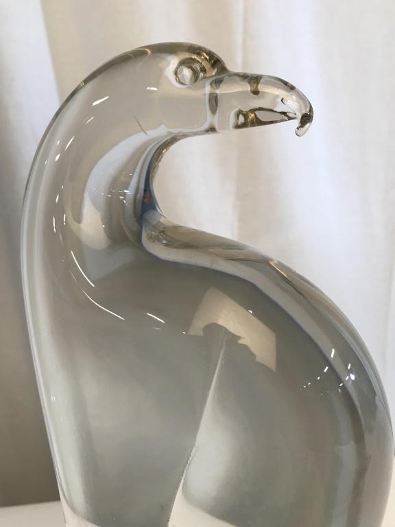 Signed OGGETTI Italian Art Glass Eagle Sculpture: Signed OGGETTI Italy on underside. Clear art glass sculpture of perched eagle, hawk bird. Measures approx 12.5 inches in height by 5.5 inches in width by 3 inches in depth. Faded label along bottom ri