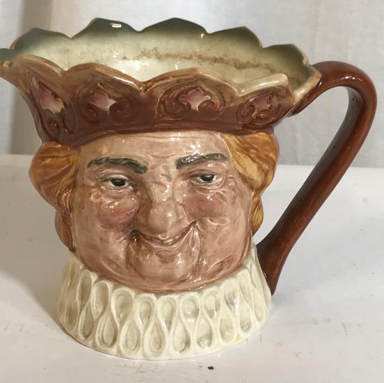 Royal Doulton Old KingCole Character Toby Jug: Royal Doulton Old-King-Cole Character-Jug Made in England. Back of pottery inscribed in ceramic ‘ Old Kingcole’. Underside reads ‘ Made in England, Royal Doulton England’ . Height 5.5 in. 5 x 