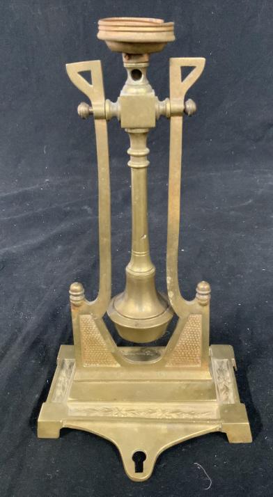 Hungarian Bronze Aesthetic Movement Sconce: Sconce, lamp base, Hungarian aesthetic movement, lamp base, home lighting and accessory markings underside, central swinging pendulum with decorative framing and arms, desk top accessory, art and desi