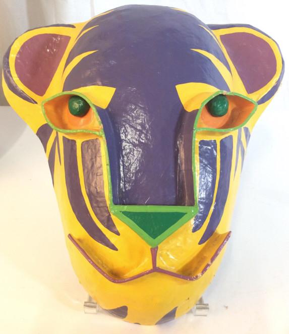 Signed Tiger Arts And Crafts Mask Decor: Appears to be signed Gua Turex, interior label reads Made in Thailand, Arts and Crafts tiger Figural paper mache mask, hand-painted, bright yellow purple and green tones, some surface wear to paint, s
