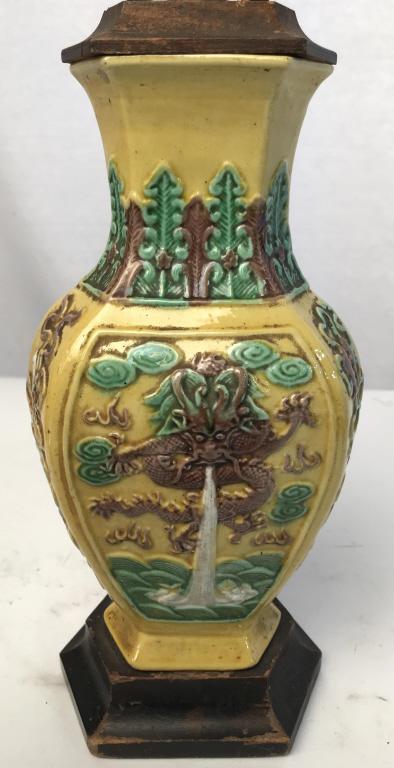 Asian Style Porcelain Lamp: Lamp is porcelain. Contains dragon detail. Measures approx 13 inches tall 5 inches wide, 3.5 inches deep. Table lamp, tabletop accessory, asian arts and crafts, orientalia, decorative arts and accesso