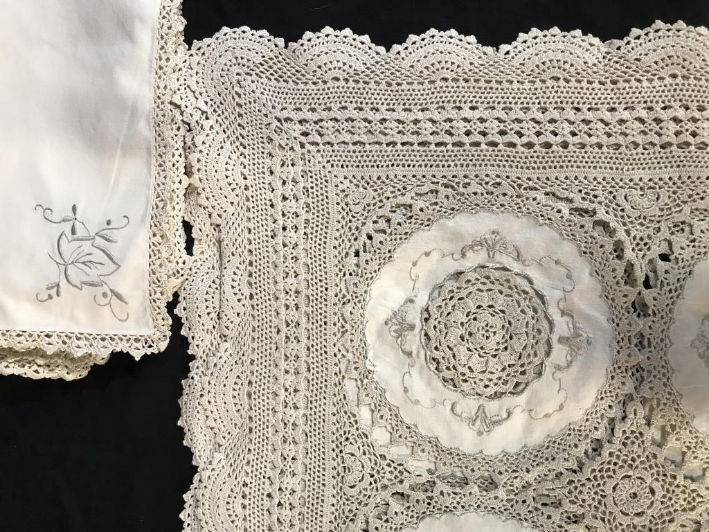 Vintage Ornate Crochet Tablecloth w Linen Napkins: Collectible vintage, possibly hand crochet and embroidered doily tablecloth with matching linen napkins. Napkins also with crochet edges and leaf embroidered detail design. Tablecloth- 10 ft, 9 in. X 