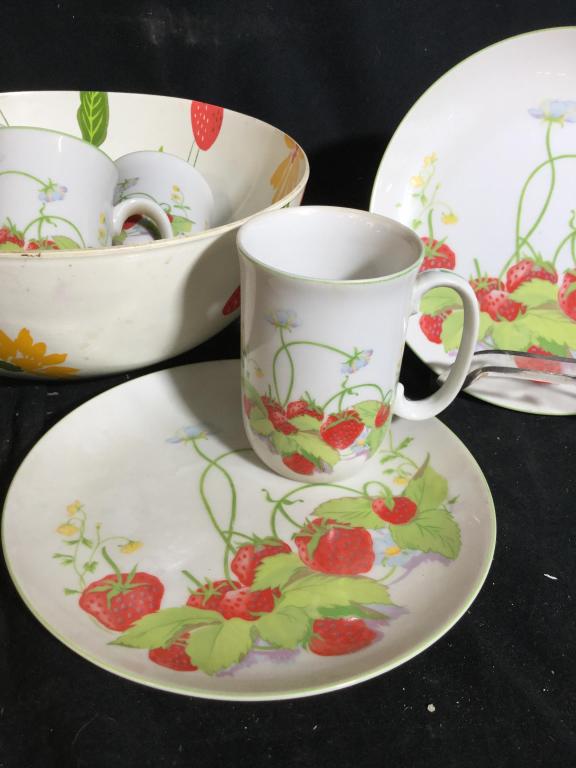 Set 6 STRAWBERRY HILL FINECHINA BY MANN and bowl: Set includes 4 strawberry printed mugs and 2 strawberry printed plates. Included is a strawberry printed bowl for storage. Bowl is not Fine China. Plates measure approximately 7.5 inches, mugs measure
