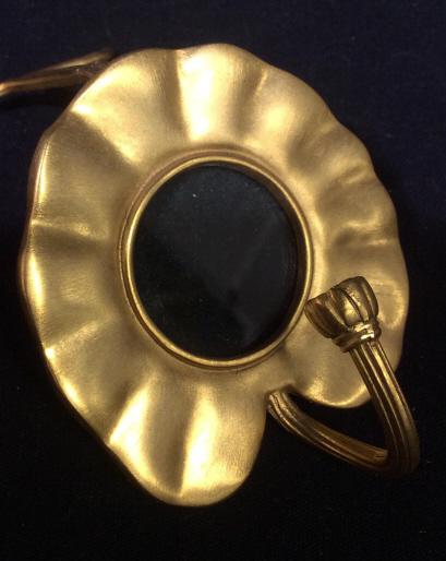 Lot 3 Vintage Brass Toned Collectibles: 3 brass toned Collectibles. Items include hanging framed portrait Coat Hook, DT Signed Angel Figural, And Brass Toned ruler/knife handy tool. Each item has vintage wear. Knife measures approximately 8