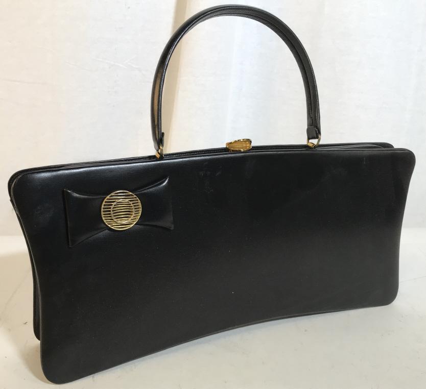 ROSART BLACK HANDBAG, VINTAGE c. 1950/60: In Original Box. Retro ROSART Purse, Handbag. Vintage hard frame, rectangular body with gold tone decor. Push button clasp, approx 5 in. Handle drop, ROSART Brand written on inside. Clean inside and o