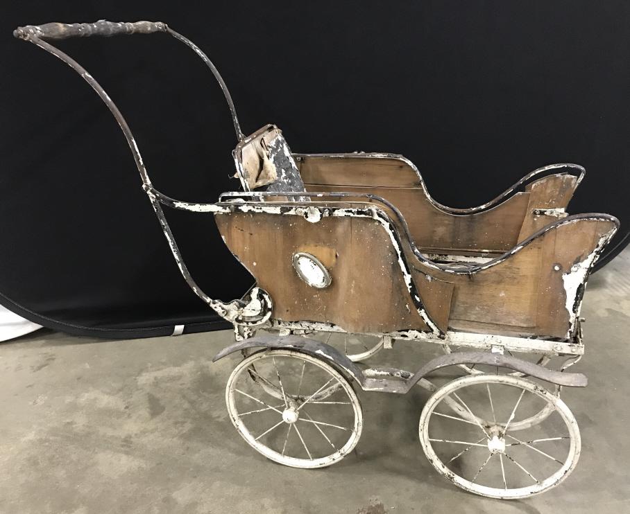 Antique Baby Stroller up cycle Garden: Antique Baby Stroller Constructed Of Metal And Wood, measures approx 39 inches long x 20 inches wide x 35.5 inches tall to handle, damage to wood bed frame, chips to painted metal frame. Antique Baby 